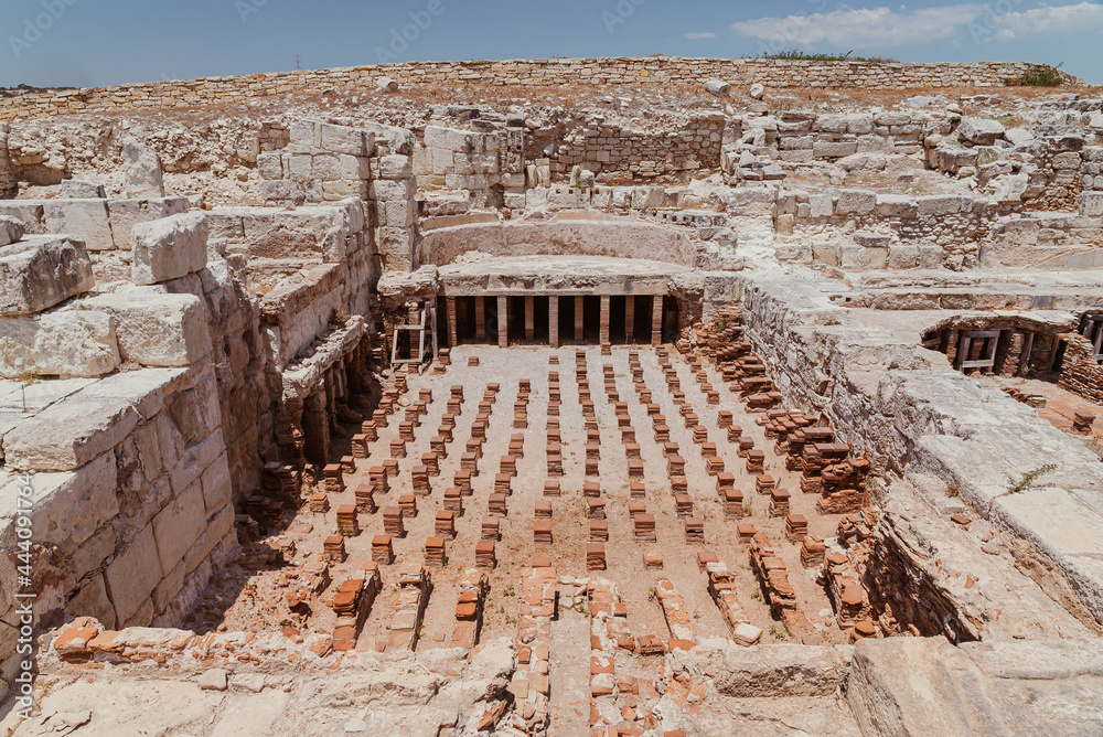 Obraz premium The ancient thermal bath ruins at the Kourion World Heritage Archaeological site near Limassol, Cyprus