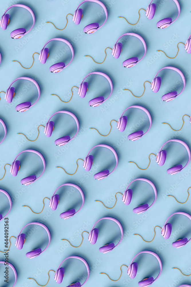 bird eye view of Violet headphones on blue background bird eye view of Violet headphones on blue background