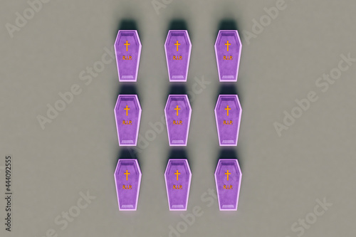 top down view of violet coffins on grey background photo
