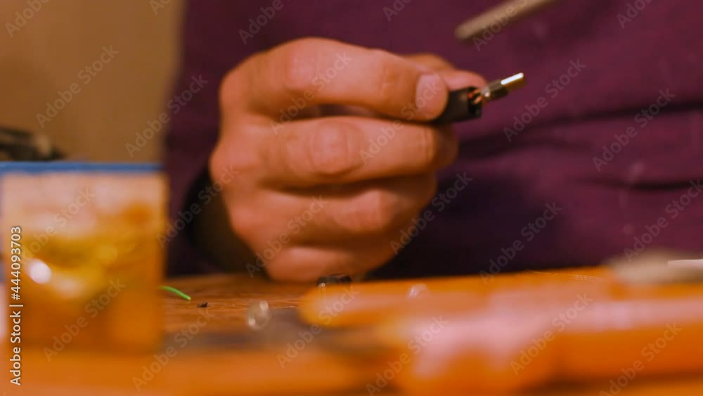 man makes a soldering close up man makes a soldering close up