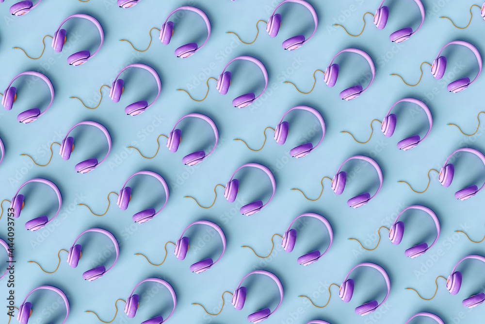 top down view of Violet headphones on blue background top down view of Violet headphones on blue background