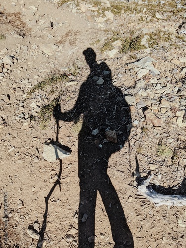 Shadow of a man hiking