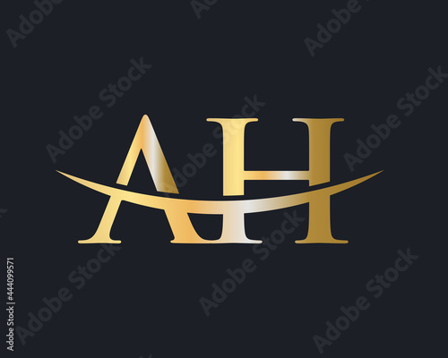 Premium Letter AH Logo Design with water wave concept. AH letter logo design photo
