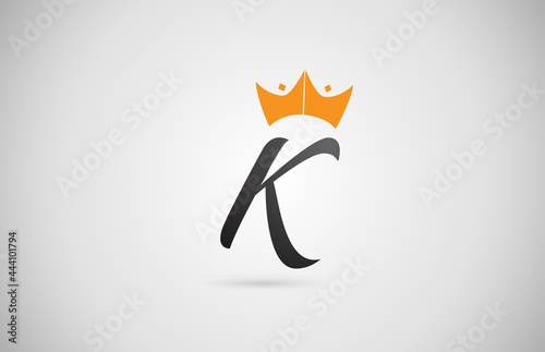 hand written K alphabet letter logo icon. Business company typography with yellow king crown. Royal style