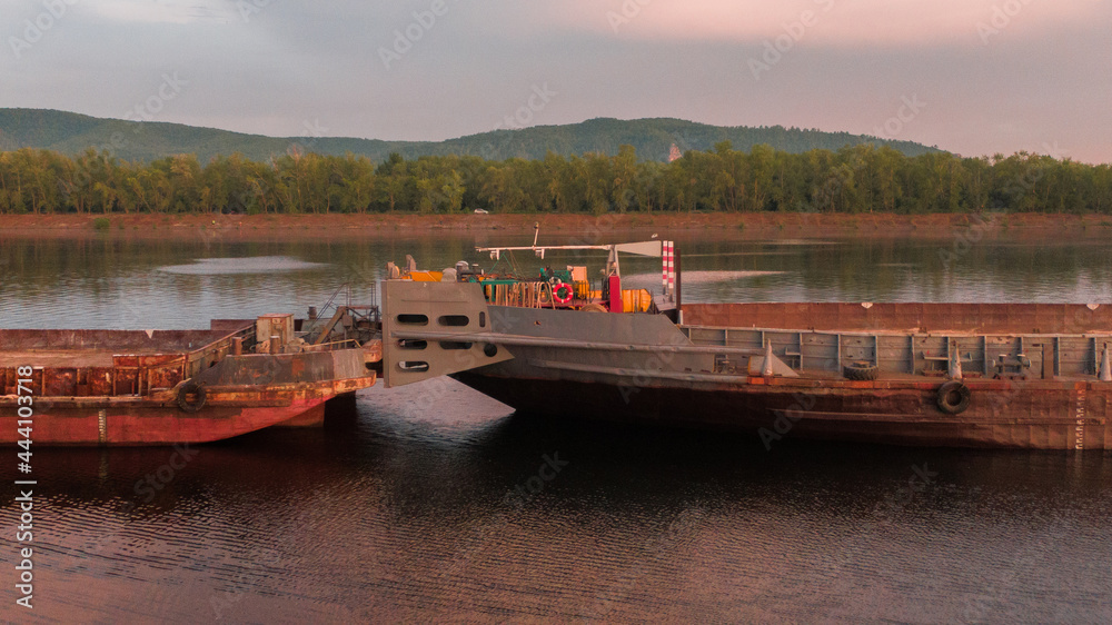 Tugboat pushing the barge ship Tugboat pushing the barge ship
