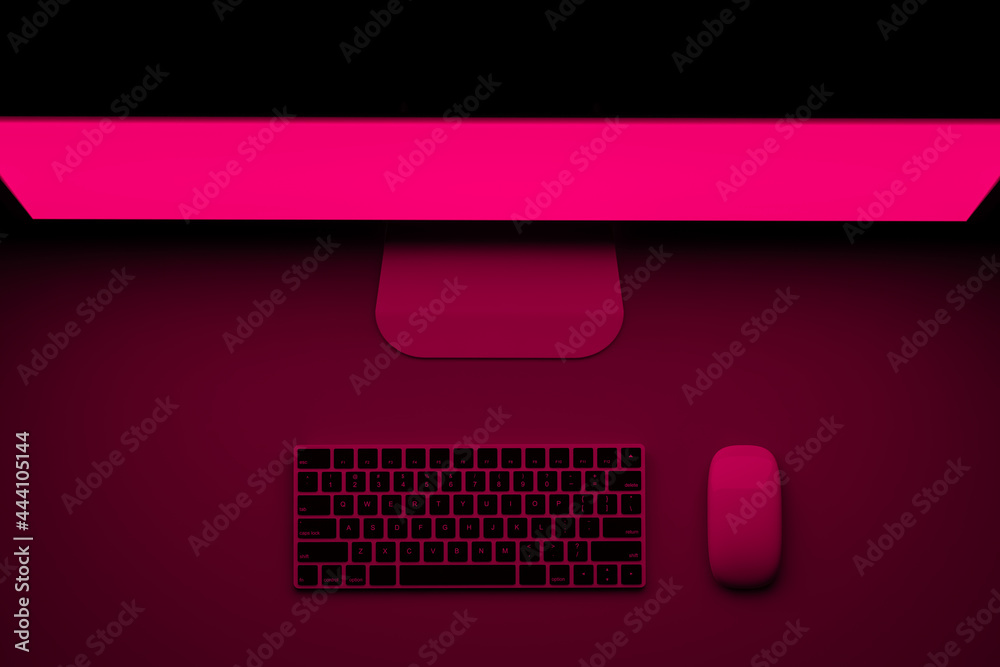 © Marcos Osorio/Stocksy - Desktop computer with fuchsia screen turned on