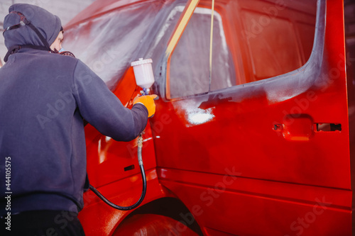 Obraz na plátně car painting in red, truck body repair.