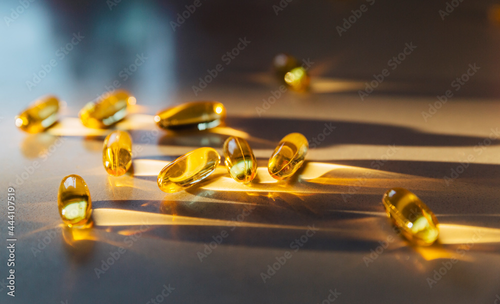 Cod Oil Capsule on counter with Vitamin D Cod Oil Capsule on counter with Vitamin D