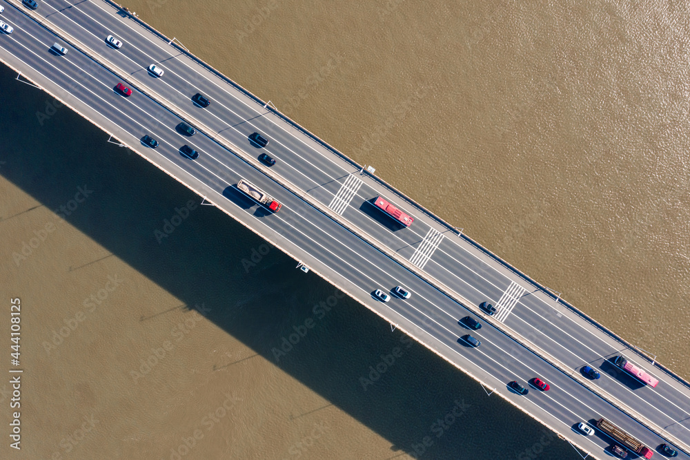 Aerial view of bridge road with cars over lake or sea Aerial view of bridge road with cars over lake or sea