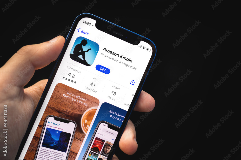 Kharkov, Ukraine - June 4, 2021: Amazon kindle app, man holds mobile ...