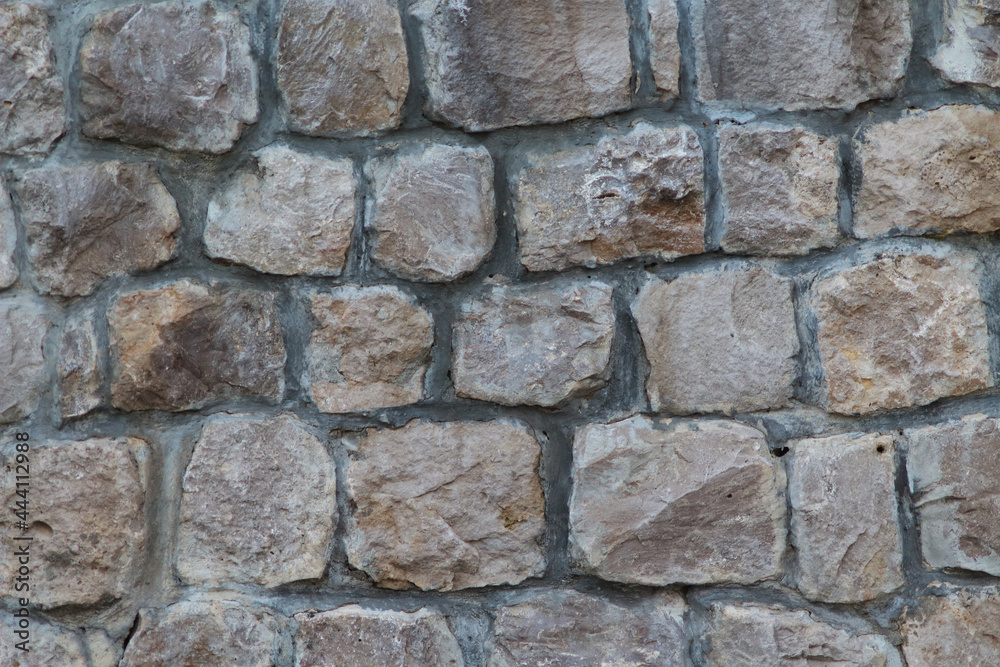 Masonry Rock Wall Texture. Texture of a stone wall. Part of old castle stone wall background. Masonry Rock Wall Texture. Texture of a stone wall. Part of old castle stone wall background.
