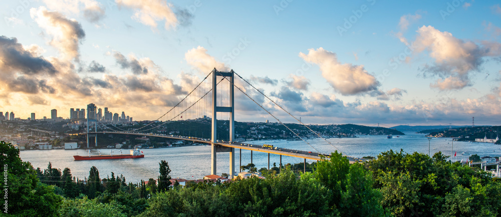 ISTANBUL, TURKEY. Panoramic view of Istanbul Bosphorus on sunset. Istanbul  Bosphorus Bridge (15 July Martyrs Bridge. Turkish: 15 Temmuz Sehitler  Koprusu). Beautiful cloudy blue sky. Stock Photo | Adobe Stock