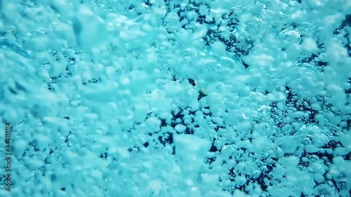 beautiful underwater scene of air bubbles from tank's diver
