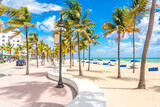 Seafront beach promenade with palm trees on a sunny day in Fort Lauderdale