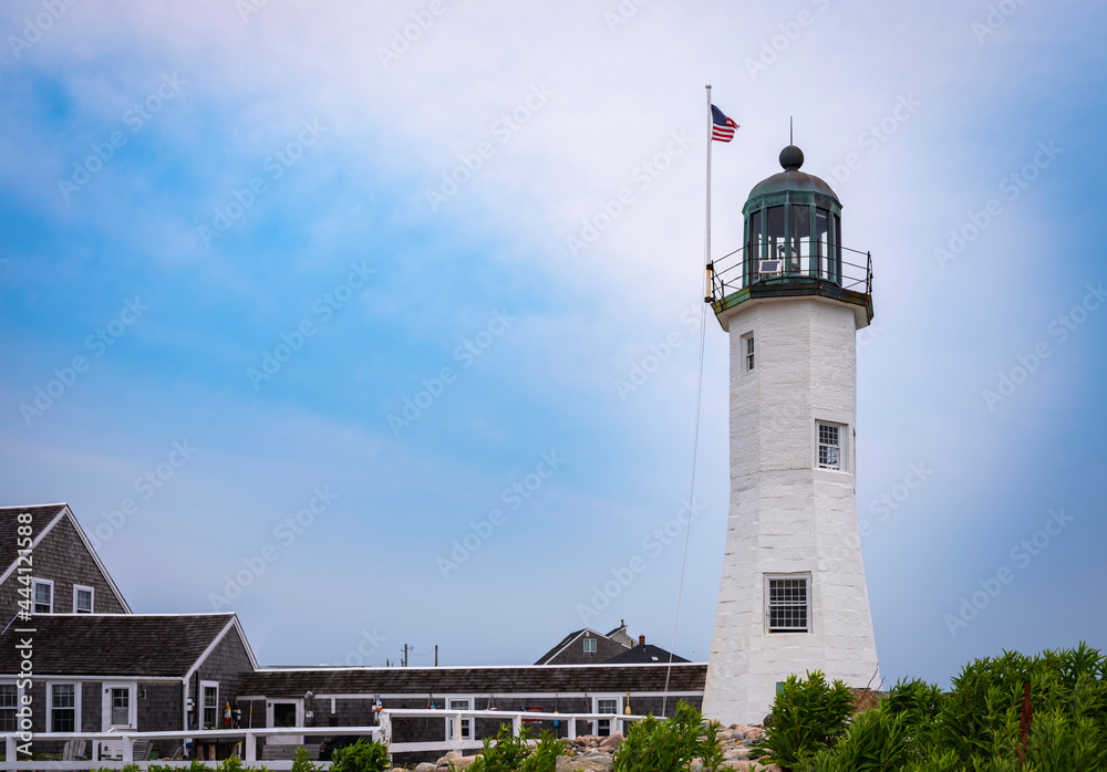 Scituate Lighthouse and Boardwalk in Scituate, Massachusetts. Historic Landmark Navigational Facility in America. Twilight Seascape Image with Space for Text and Design.