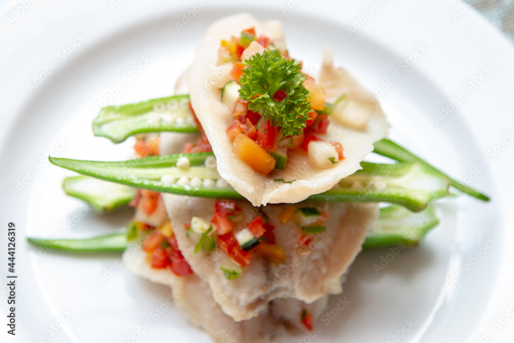 Sautéed Fish Filet served Sliced Okra & Cubed Garnish Sautéed Fish Filet served Sliced Okra & Cubed Garnish
