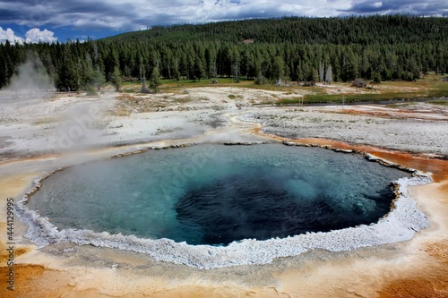 crested pool hot spring and orange microbial mat at the old faithful geyser basin, yellowstone national park, wyoming