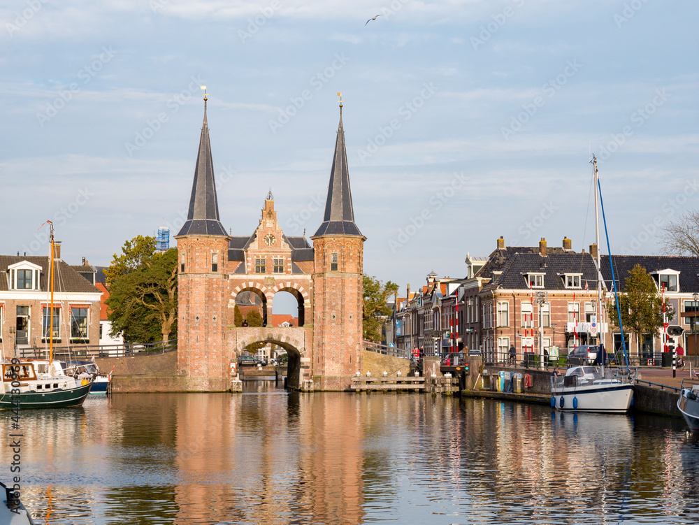 Waterpoort, water gate, and Kolk canal in city of Snits, Sneek in Friesland, Netherlands