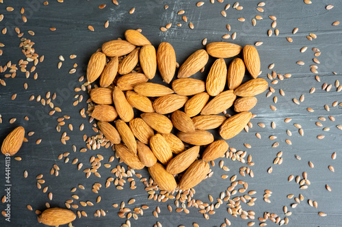 Almond heart shape over dark textured background