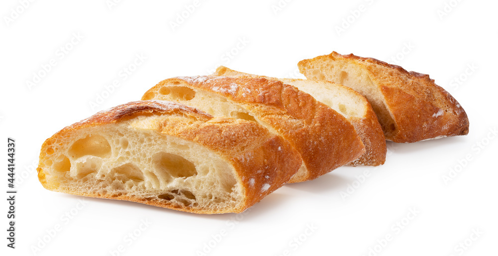A sliced baguette placed on a white background.