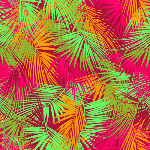 Colorful palm tree branches on abstract background. Seamless background.