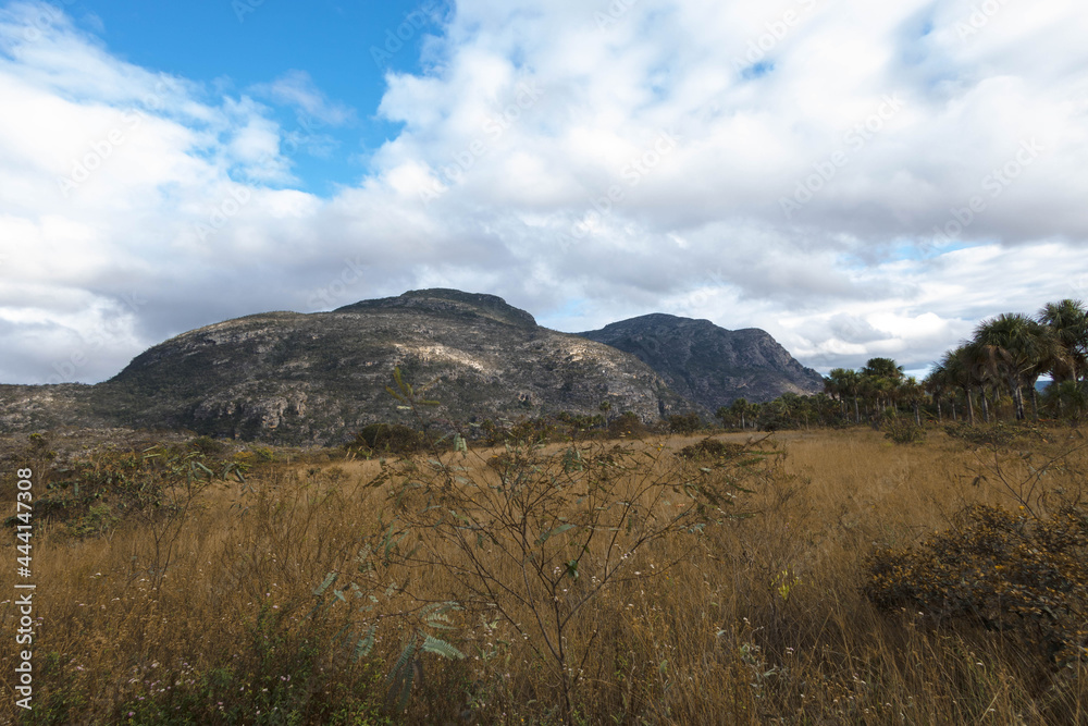 Beautiful mountain with vegetation and clouds in the sky. Broadleaf, Botumirim, Minas Gerais, Brazil. Beautiful mountain with vegetation and clouds in the sky. Broadleaf, Botumirim, Minas Gerais, Brazil.