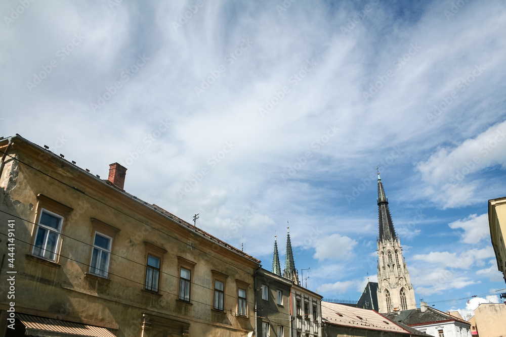 Main tower and steeple of Saint Elizabeth cathedral in Kosice, Slovakia, seen from nearby building. Also called dom svatej alzbety, it is the main landmark of Kosice and a catholic cathedral...