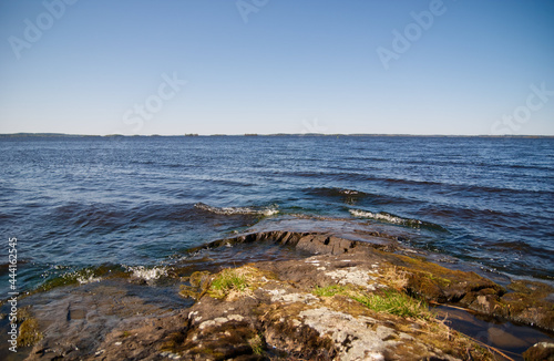 Big lake, Vanaja rocky shore with small waves photo