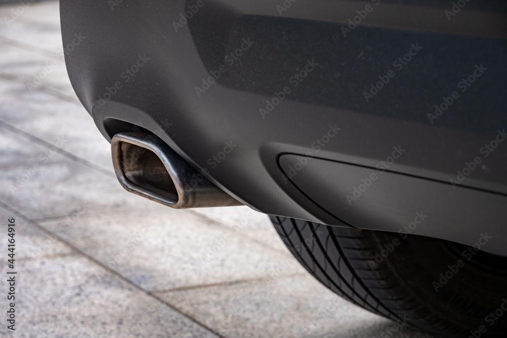 Car exhaust pipe close-up