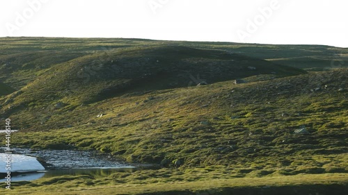 moving along the awesome mountain scenery on Stekenjokk at the arrival of summer, in Sweden. place called Wildernessroad photo