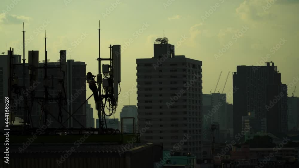 Staff are checking the communication system on the roof. Staff are checking the communication system on the roof.