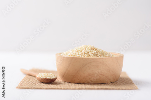 Sesame seeds on white background. Ingredients in vegetarian and Asian cuisines contain abundant nutrients. Minimalism style simple and copy space