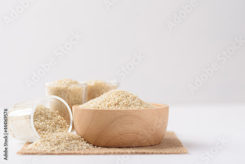 Sesame seeds on white background. Ingredients in vegetarian and Asian cuisines contain abundant nutrients. Minimalism style simple and copy space