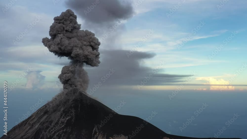 Heavy grey ash is emitted from very active volcano Fuego, Guatemala, Central america