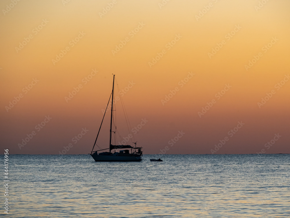 Sunset at Long Point with yacht anchored for the night, Port Kennedy