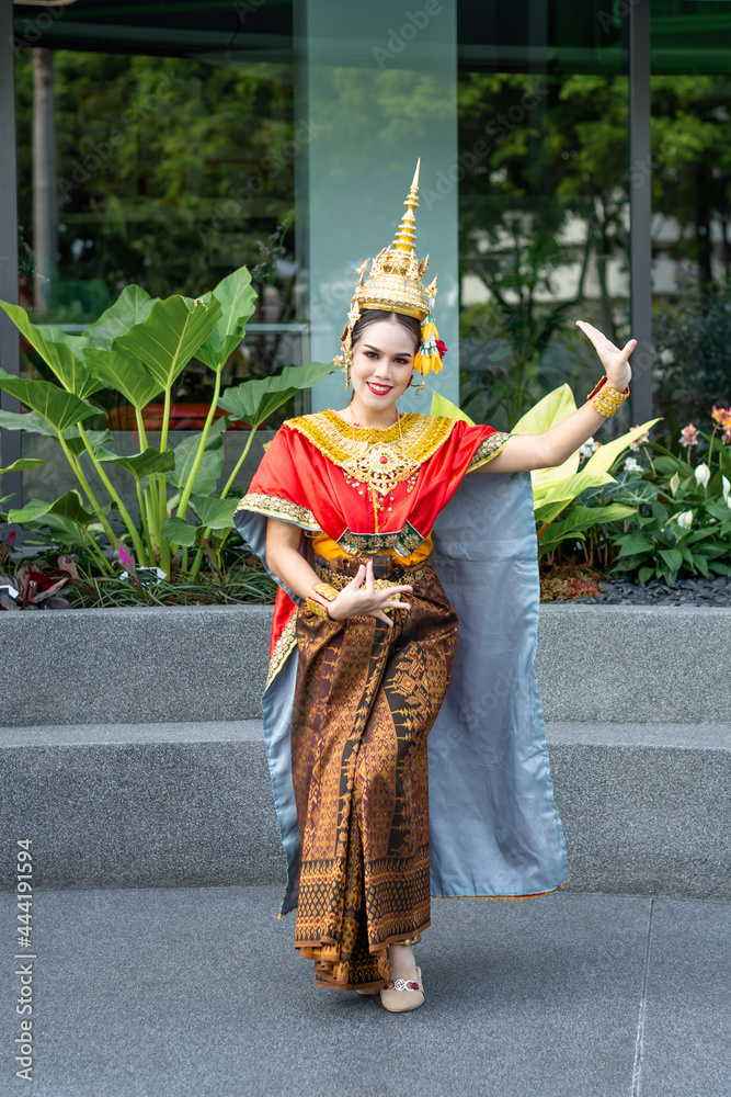 Beautiful Thai girl in traditional dress red dancer costume, identity  culture of Thailand. Basic Thai folk dancer of women wearing thai dress  dancing lady. Stock Photo | Adobe Stock