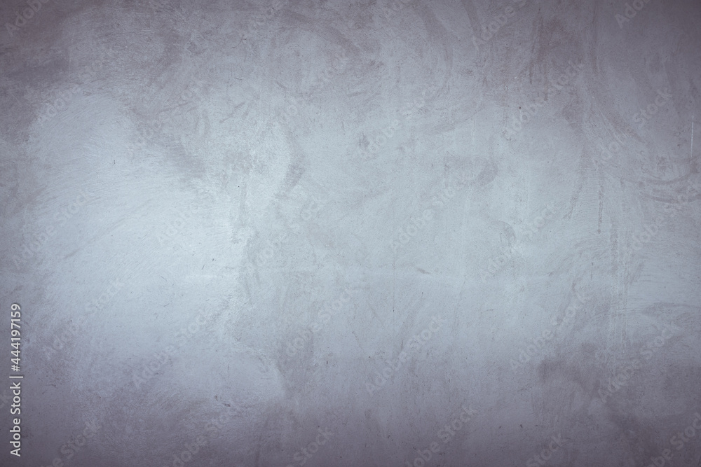 The background of a gray concrete wall, the texture of natural concrete The background of a gray concrete wall, the texture of natural concrete