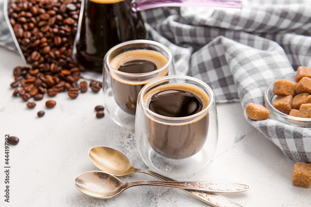 Cups of turkish coffee on light background Cups of turkish coffee on light background