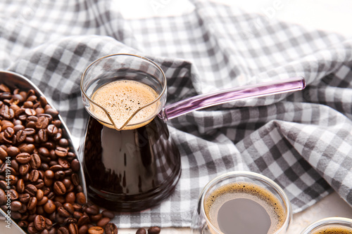 Freshly brewed coffee in gl...
