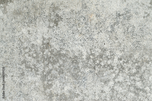 A background or backdrop photo of gray concrete wall texture, scene of setting up a wall around