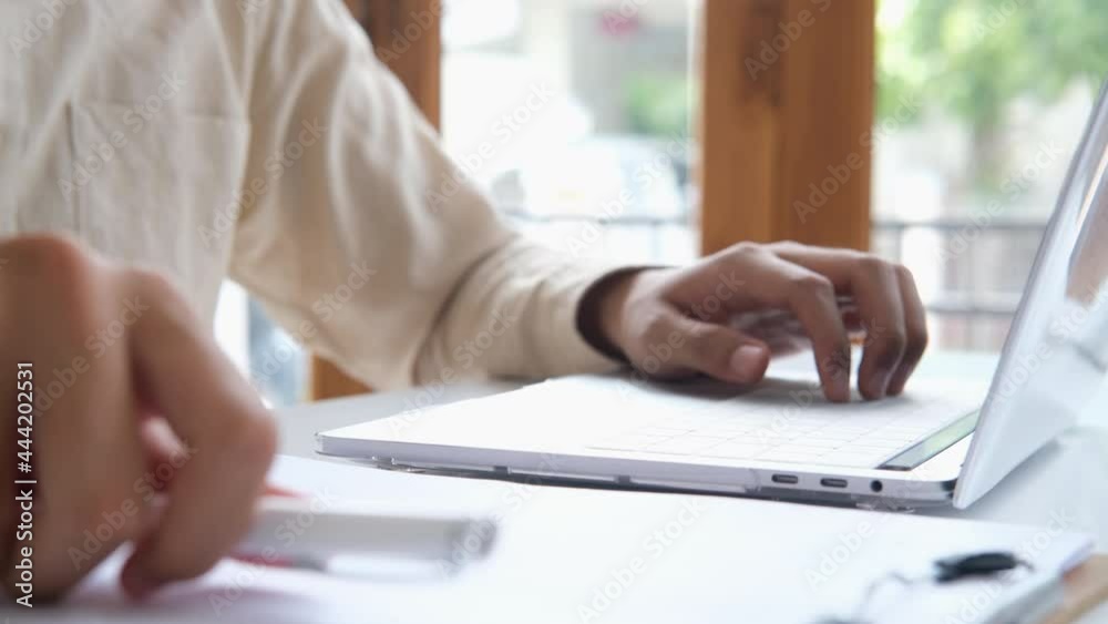 Closeup hand using typing computer laptop Closeup hand using typing computer laptop