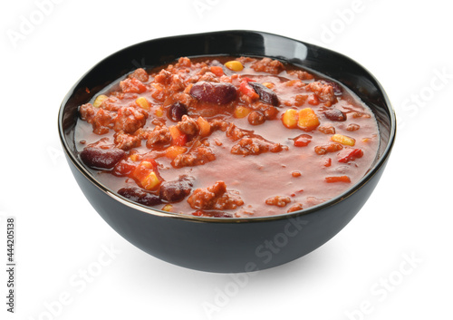 Bowl with delicious chili con carne on white background