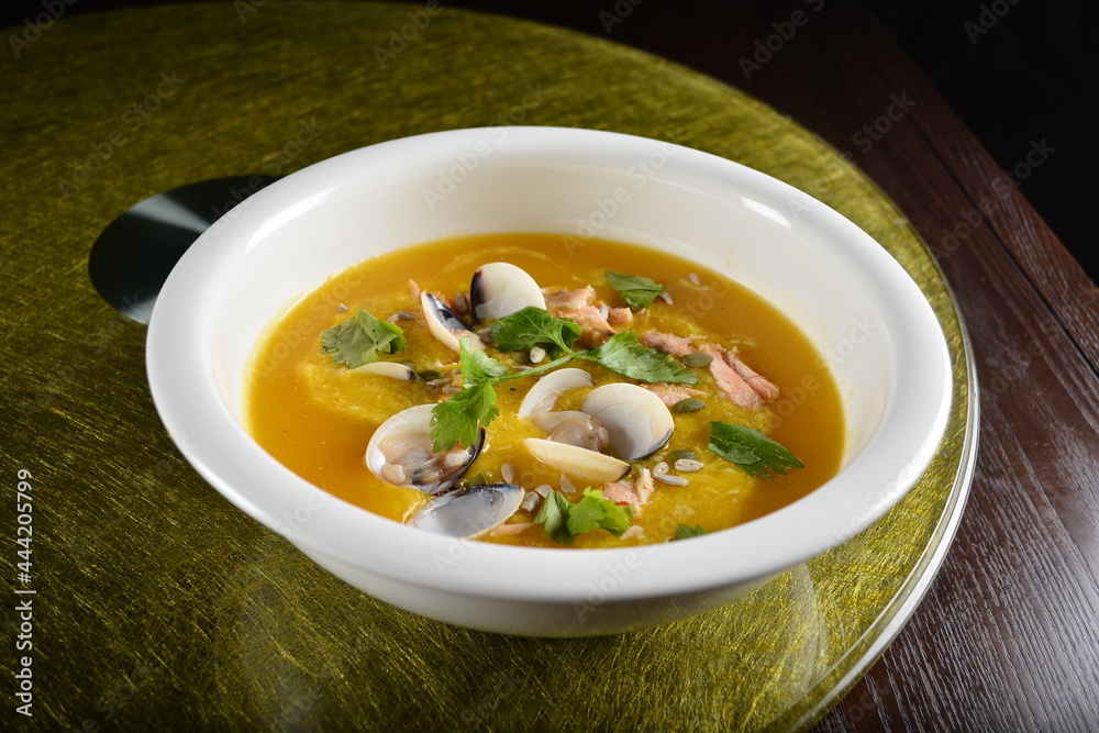 asian premium banquet menu double boiled seafood with shell yellow stock pumpkin thick soup on gold background dining table asian premium banquet menu double boiled seafood with shell yellow stock pumpkin thick soup on gold background dining table