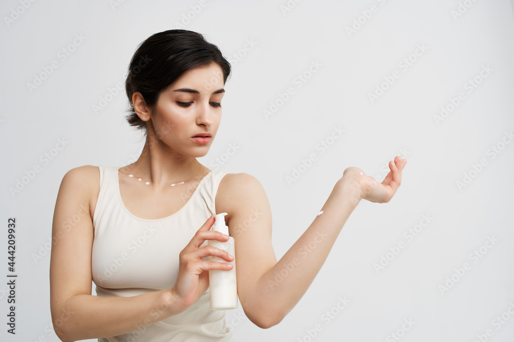 woman applying lotion on hand moisturizing clean skin health woman applying lotion on hand moisturizing clean skin health