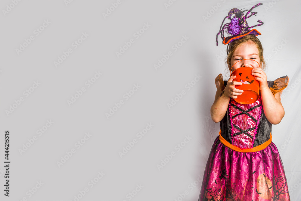 Little cute girl in witch costume for Halloween Little cute girl in witch costume for Halloween