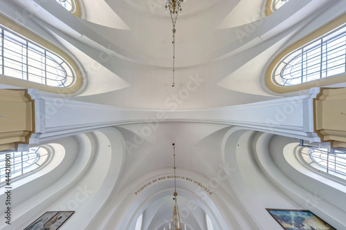  interior dome and looking up into a old gothic catholic  church ceiling