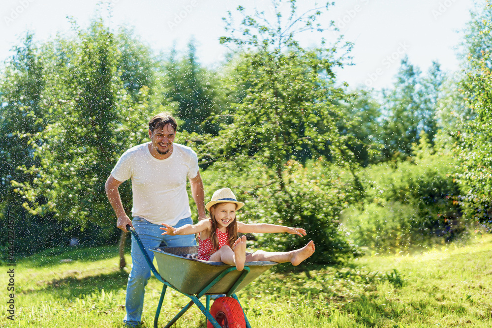 happy-little-girl-preschool-age-has-fun-laughs-riding-on-garden