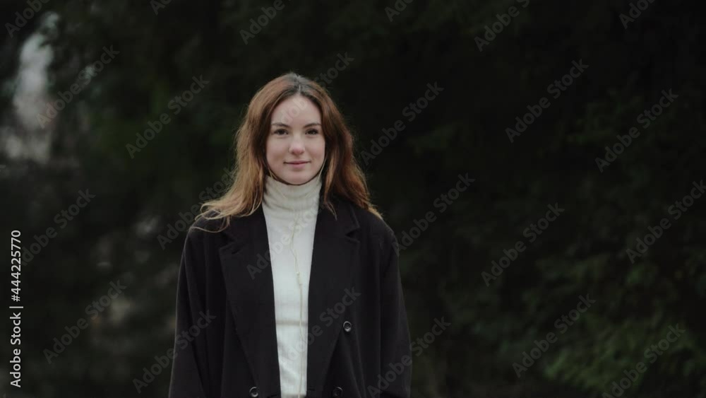 Young Woman Standing Outdoors Young Woman Standing Outdoors