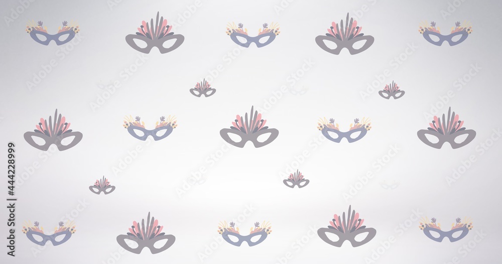Obraz premium Composition of masquerade masks repeated in rows, on pale grey background