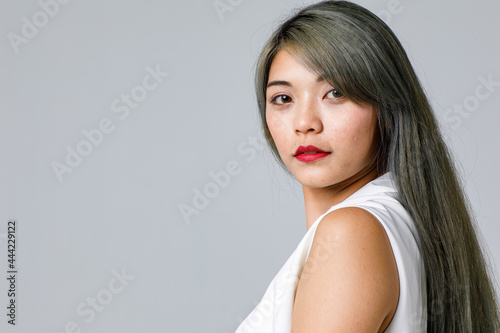Asian woman isolated on white background.